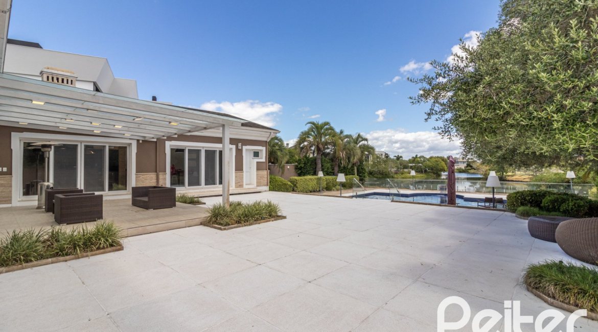 Casa em Condomínio à venda com 445m², 4 dormitórios, 4 suítes, 4 vagas, no bairro Terra Ville em Porto Alegre