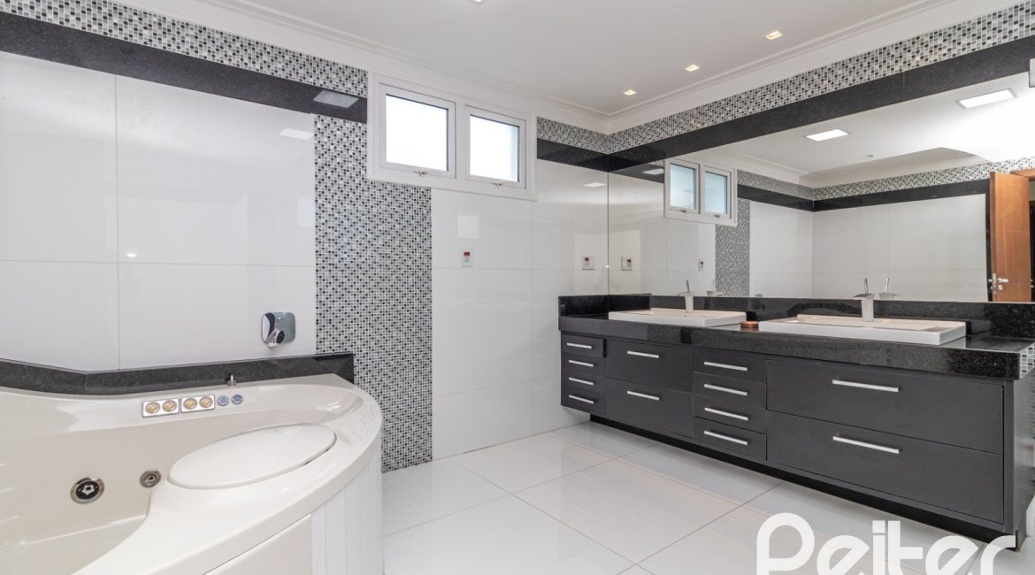 Casa em Condomínio à venda com 445m², 4 dormitórios, 4 suítes, 4 vagas, no bairro Terra Ville em Porto Alegre