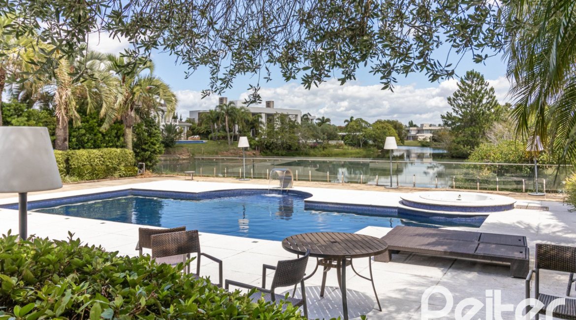 Casa em Condomínio à venda com 445m², 4 dormitórios, 4 suítes, 4 vagas, no bairro Terra Ville em Porto Alegre