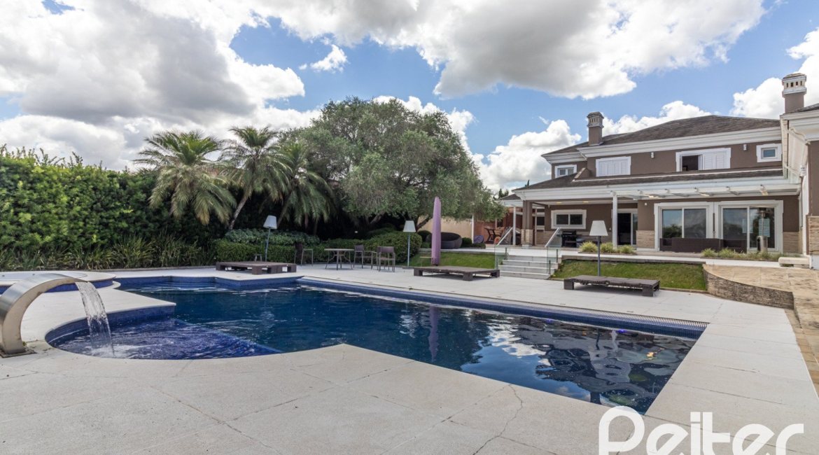 Casa em Condomínio à venda com 445m², 4 dormitórios, 4 suítes, 4 vagas, no bairro Terra Ville em Porto Alegre