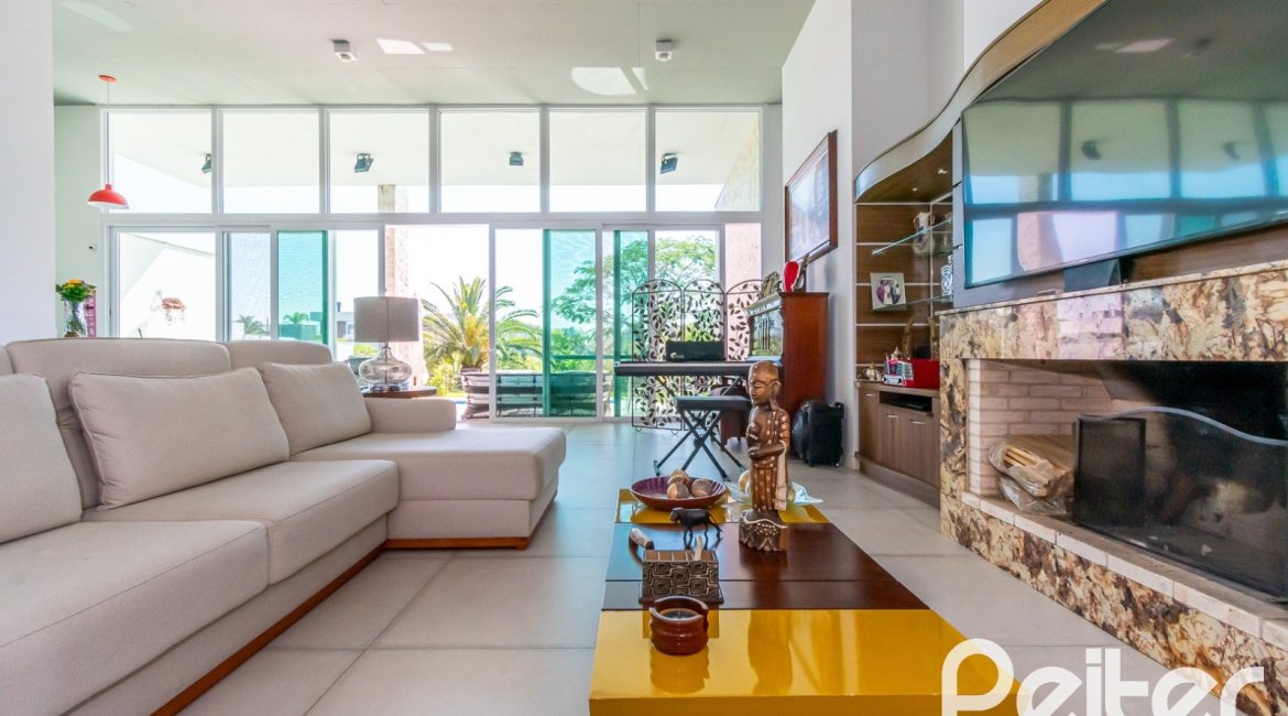 Casa em Condomínio à venda com 420m², 4 dormitórios, 4 suítes, 6 vagas, no bairro Terra Ville em PORTO ALEGRE