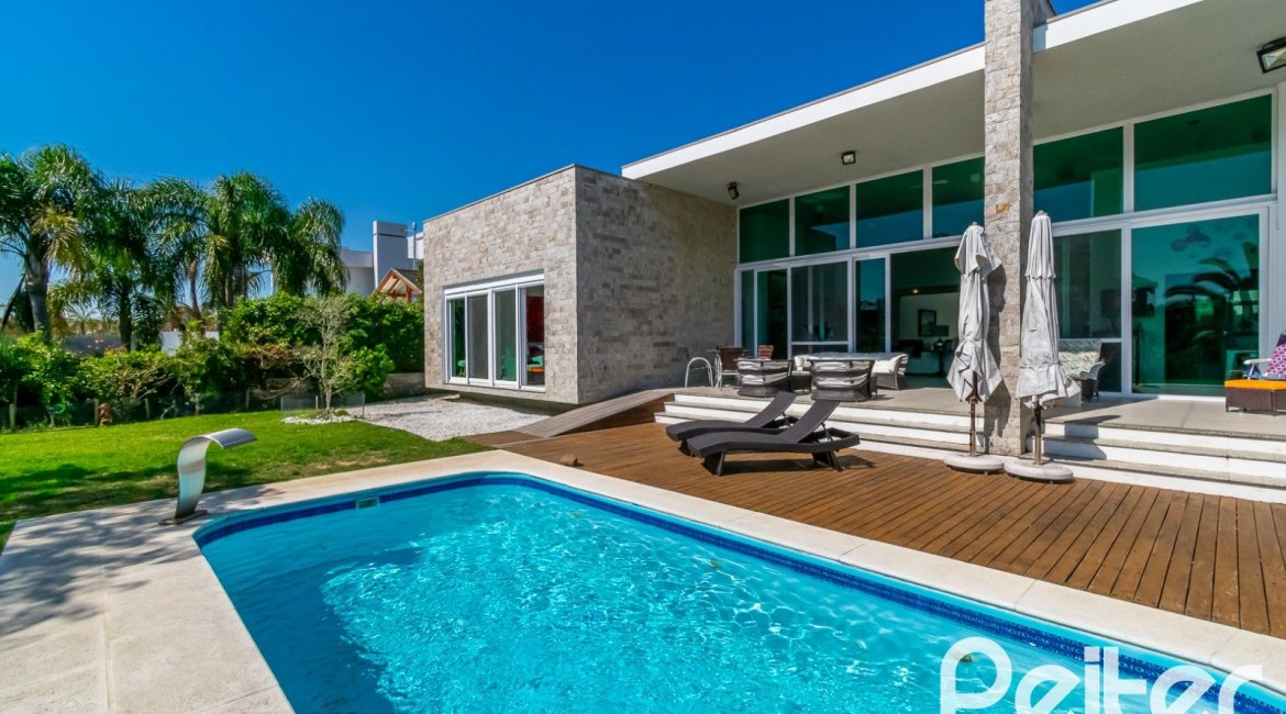 Casa em Condomínio à venda com 420m², 4 dormitórios, 4 suítes, 6 vagas, no bairro Terra Ville em PORTO ALEGRE