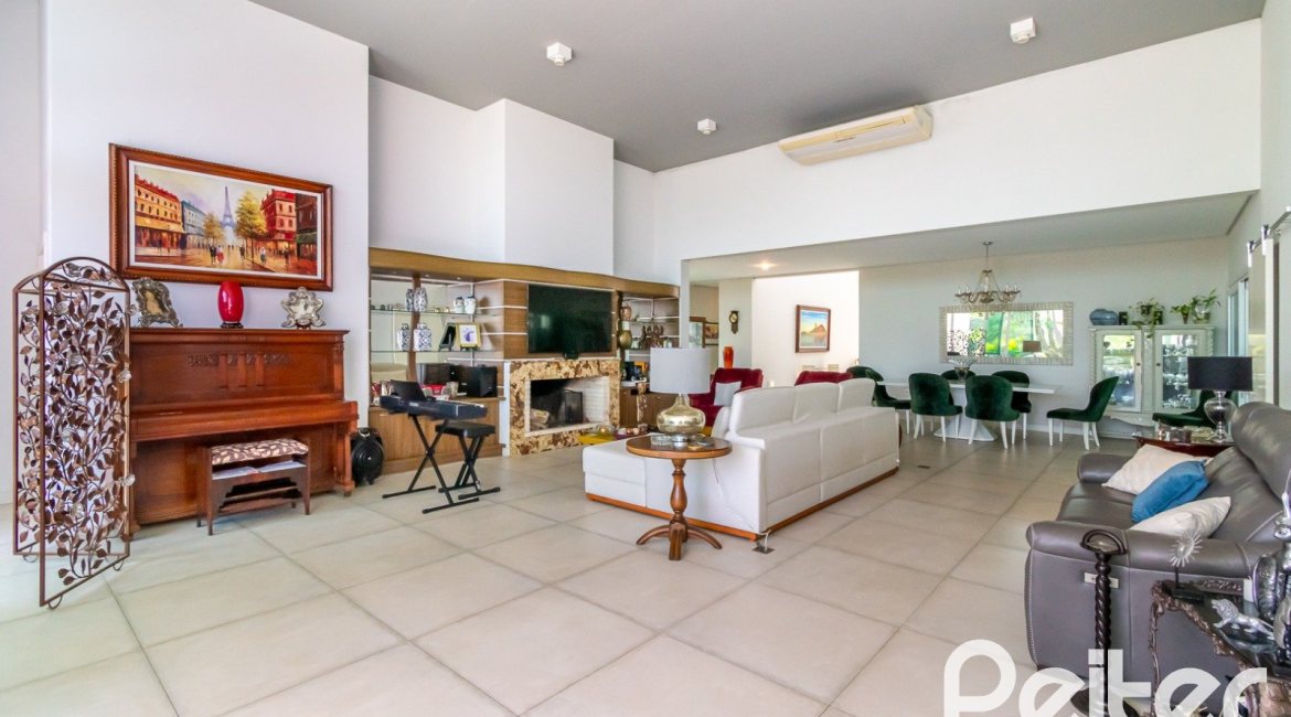 Casa em Condomínio à venda com 420m², 4 dormitórios, 4 suítes, 6 vagas, no bairro Terra Ville em PORTO ALEGRE