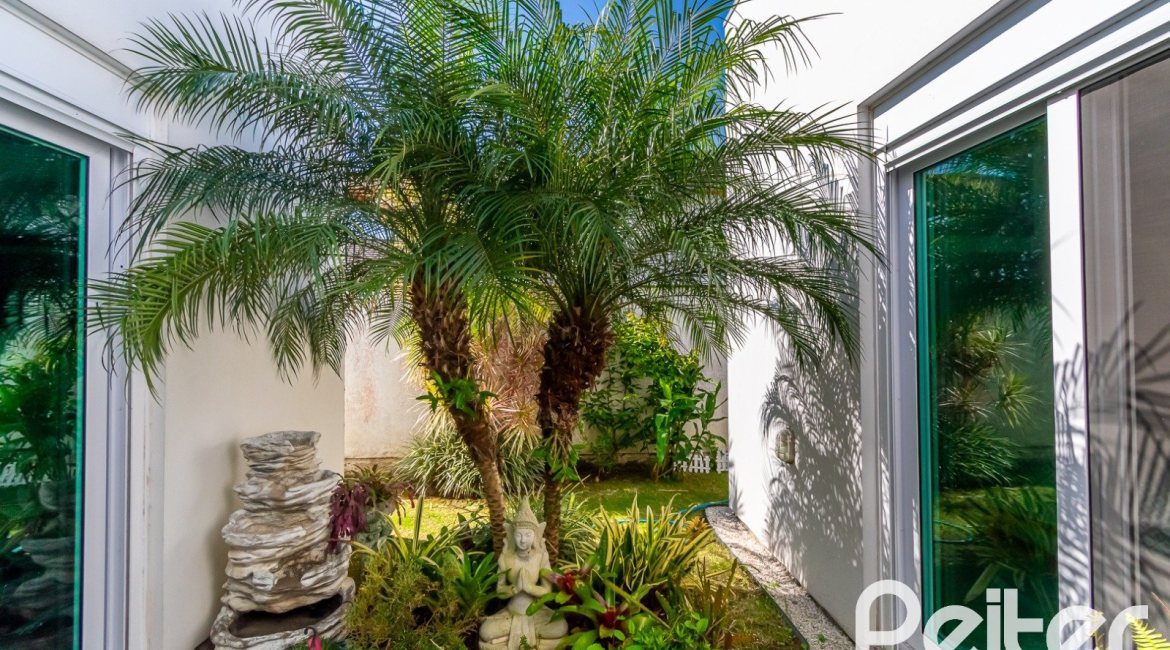 Casa em Condomínio à venda com 420m², 4 dormitórios, 4 suítes, 6 vagas, no bairro Terra Ville em PORTO ALEGRE