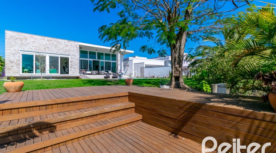 Casa em Condomínio à venda com 420m², 4 dormitórios, 4 suítes, 6 vagas, no bairro Terra Ville em PORTO ALEGRE