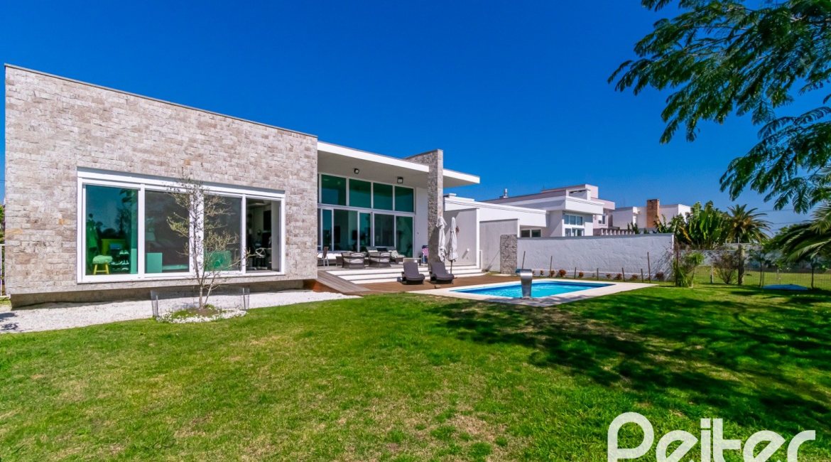 Casa em Condomínio à venda com 420m², 4 dormitórios, 4 suítes, 6 vagas, no bairro Terra Ville em PORTO ALEGRE