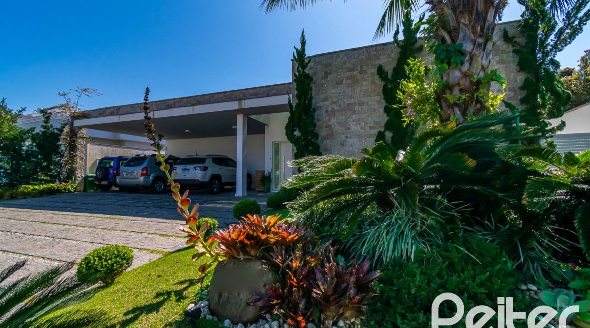 Casa em Condomínio à venda com 420m², 4 dormitórios, 4 suítes, 6 vagas, no bairro Terra Ville em PORTO ALEGRE