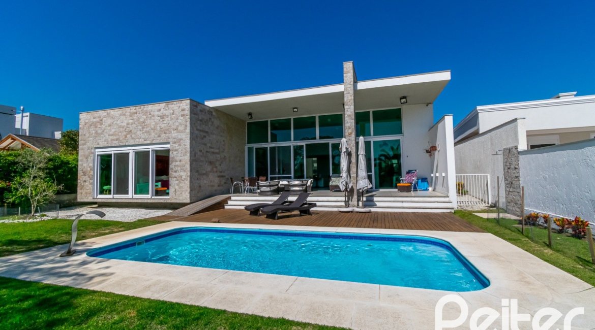 Casa em Condomínio à venda com 420m², 4 dormitórios, 4 suítes, 6 vagas, no bairro Terra Ville em PORTO ALEGRE