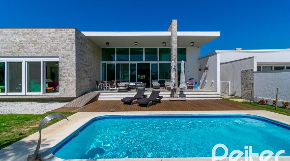 Casa em Condomínio à venda com 420m², 4 dormitórios, 4 suítes, 6 vagas, no bairro Terra Ville em PORTO ALEGRE