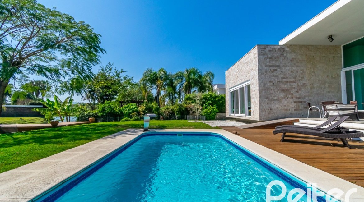 Casa em Condomínio à venda com 420m², 4 dormitórios, 4 suítes, 6 vagas, no bairro Terra Ville em PORTO ALEGRE