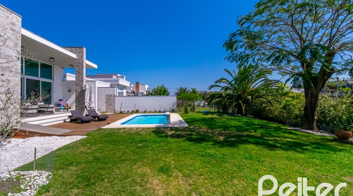 Casa em Condomínio à venda com 420m², 4 dormitórios, 4 suítes, 6 vagas, no bairro Terra Ville em PORTO ALEGRE