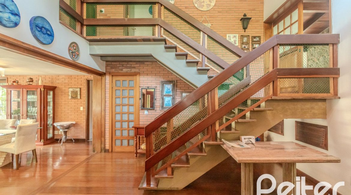 Casa em Condomínio à venda com 395m², 4 dormitórios, 4 suítes, 4 vagas, no bairro Cavalhada em PORTO ALEGRE