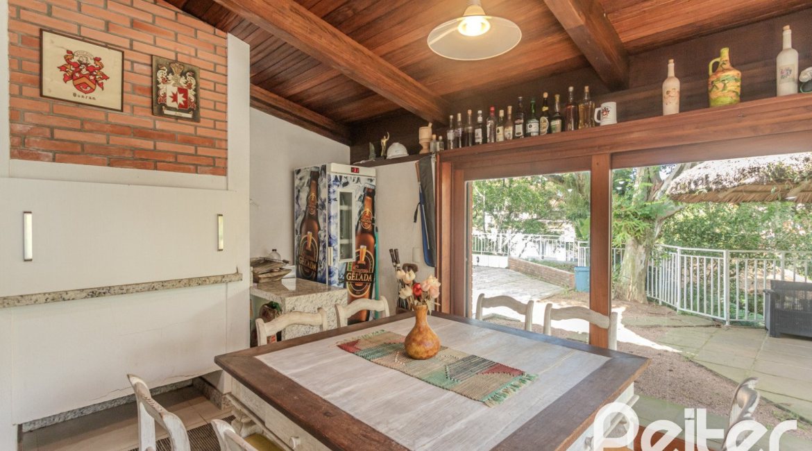 Casa em Condomínio à venda com 395m², 4 dormitórios, 4 suítes, 4 vagas, no bairro Cavalhada em PORTO ALEGRE