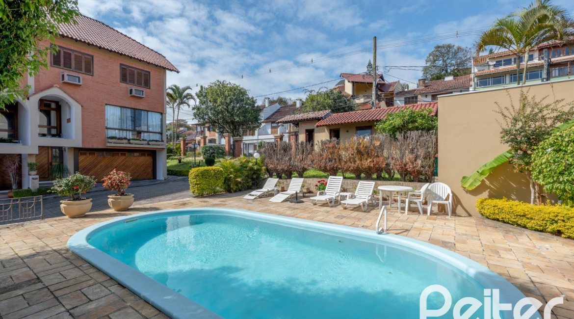 Casa em Condomínio à venda com 145m², 3 dormitórios, 1 suíte, 2 vagas, no bairro Tristeza em Porto Alegre