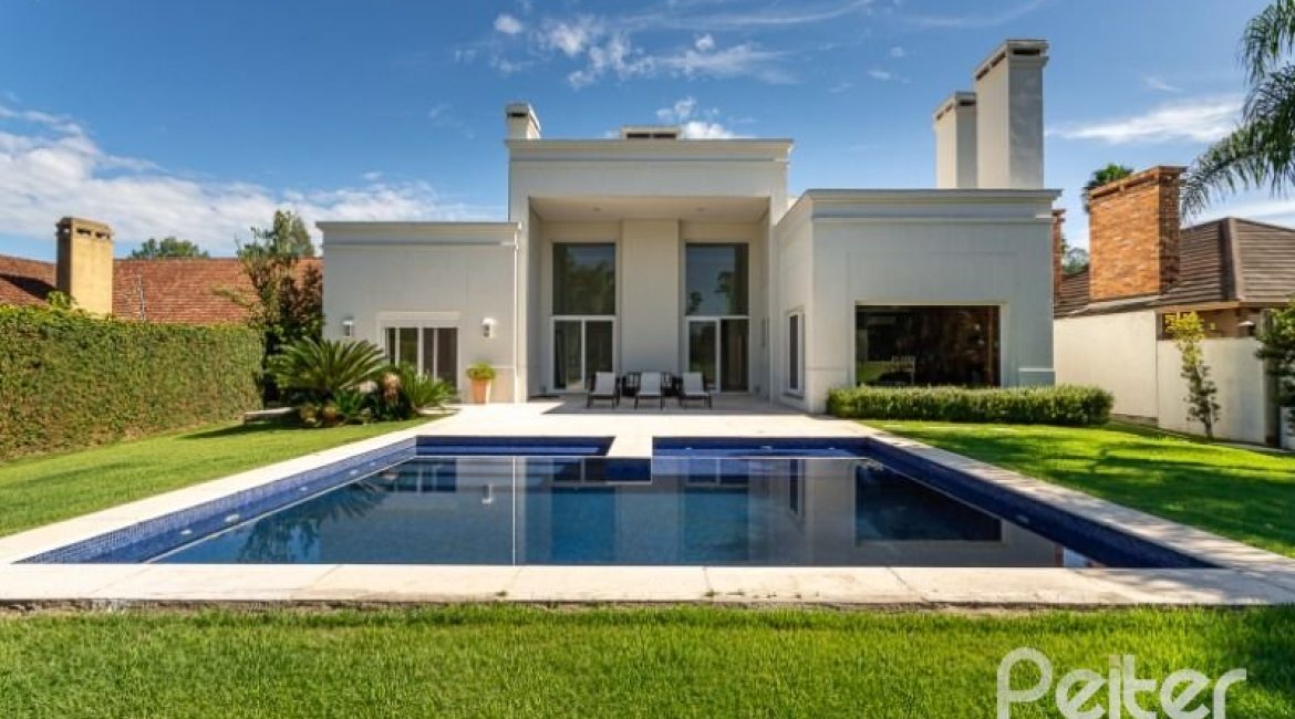 Casa em Condomínio à venda com 550m², 3 dormitórios, 3 suítes, 4 vagas, no bairro Terra Ville em PORTO ALEGRE