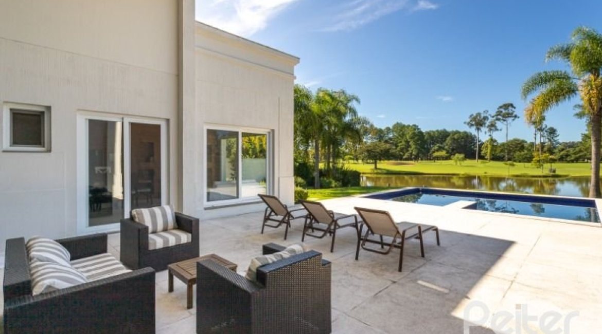 Casa em Condomínio à venda com 550m², 3 dormitórios, 3 suítes, 4 vagas, no bairro Terra Ville em PORTO ALEGRE