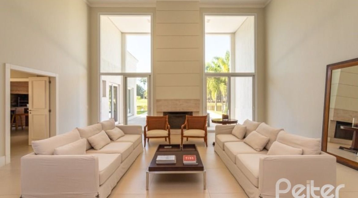 Casa em Condomínio à venda com 550m², 3 dormitórios, 3 suítes, 4 vagas, no bairro Terra Ville em PORTO ALEGRE