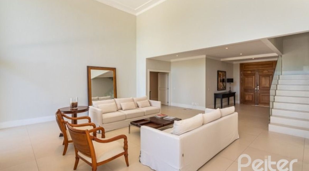 Casa em Condomínio à venda com 550m², 3 dormitórios, 3 suítes, 4 vagas, no bairro Terra Ville em PORTO ALEGRE