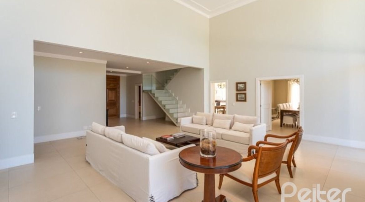 Casa em Condomínio à venda com 550m², 3 dormitórios, 3 suítes, 4 vagas, no bairro Terra Ville em PORTO ALEGRE