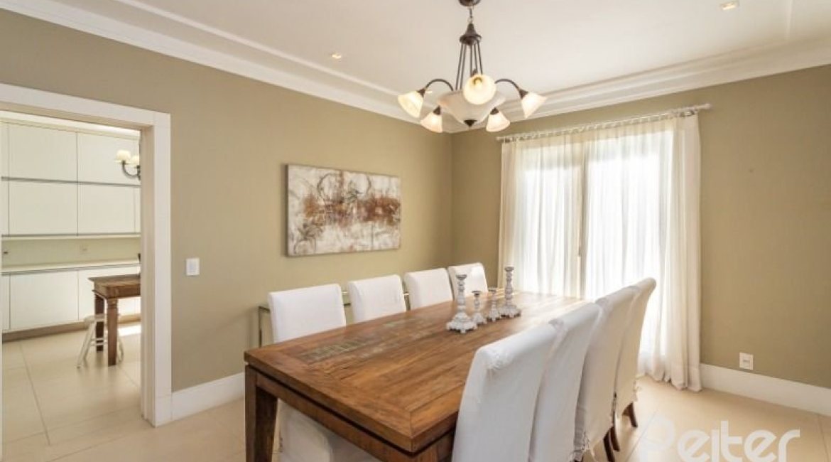 Casa em Condomínio à venda com 550m², 3 dormitórios, 3 suítes, 4 vagas, no bairro Terra Ville em PORTO ALEGRE