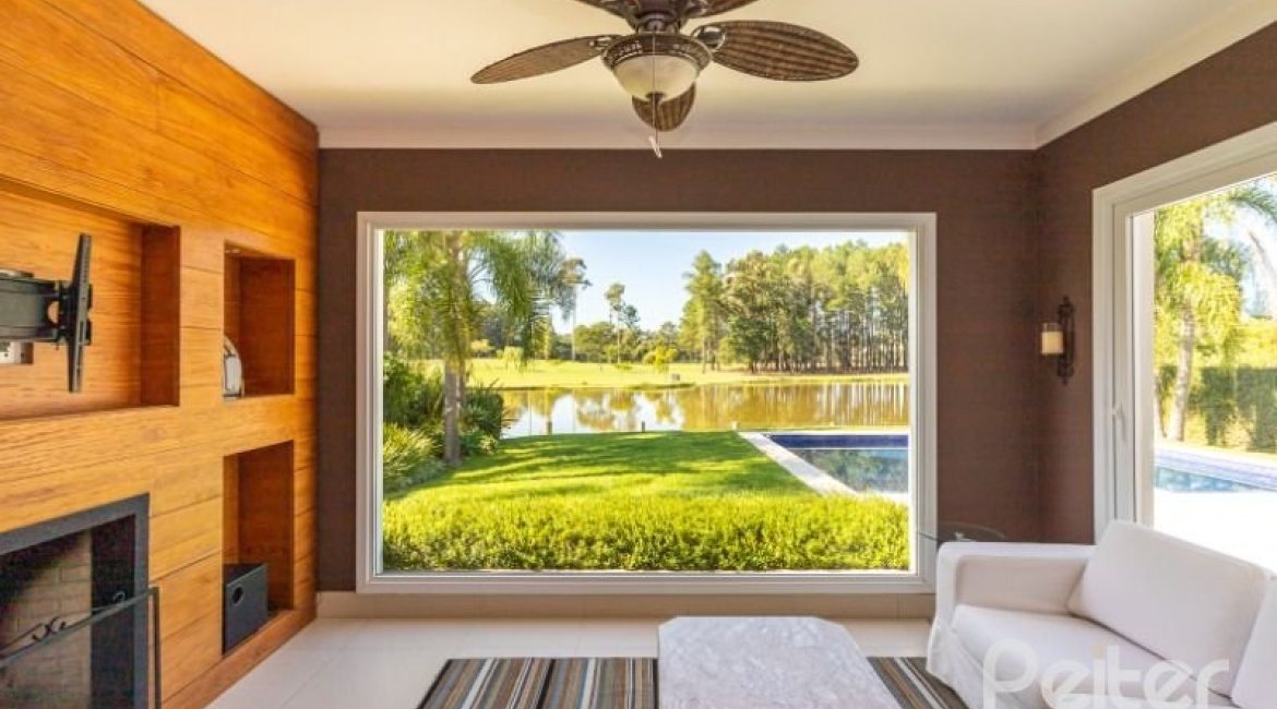 Casa em Condomínio à venda com 550m², 3 dormitórios, 3 suítes, 4 vagas, no bairro Terra Ville em PORTO ALEGRE