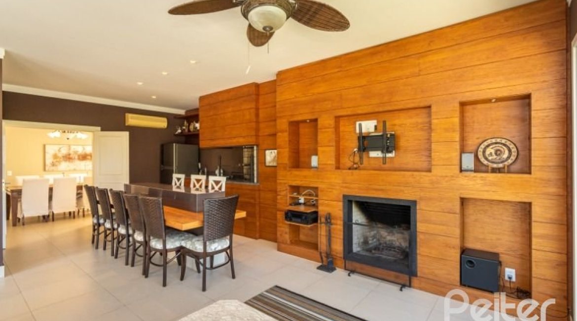 Casa em Condomínio à venda com 550m², 3 dormitórios, 3 suítes, 4 vagas, no bairro Terra Ville em PORTO ALEGRE