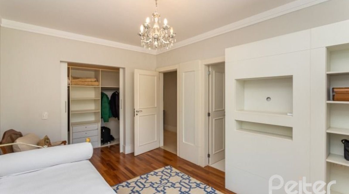 Casa em Condomínio à venda com 550m², 3 dormitórios, 3 suítes, 4 vagas, no bairro Terra Ville em PORTO ALEGRE