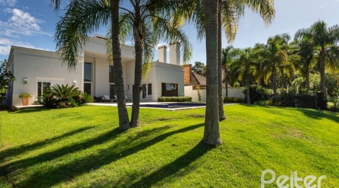 Casa em Condomínio à venda com 550m², 3 dormitórios, 3 suítes, 4 vagas, no bairro Terra Ville em PORTO ALEGRE