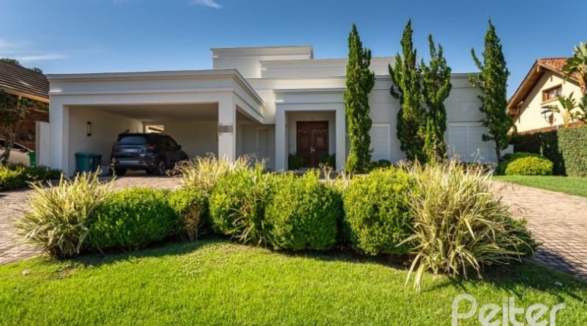 Casa em Condomínio à venda com 550m², 3 dormitórios, 3 suítes, 4 vagas, no bairro Terra Ville em PORTO ALEGRE