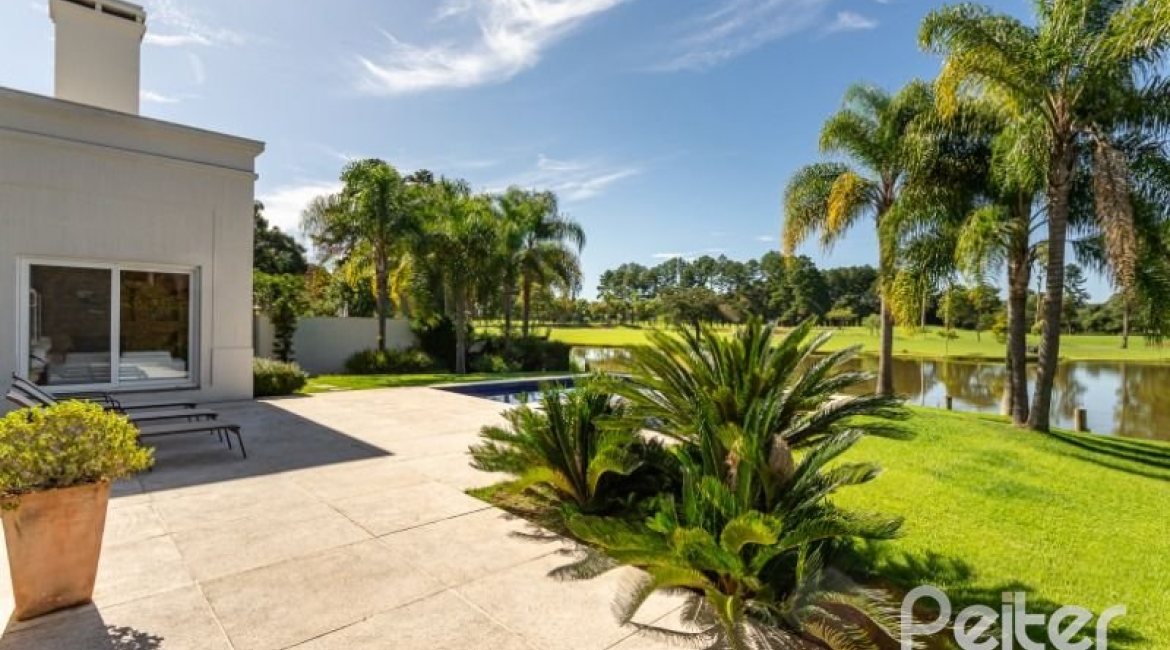 Casa em Condomínio à venda com 550m², 3 dormitórios, 3 suítes, 4 vagas, no bairro Terra Ville em PORTO ALEGRE