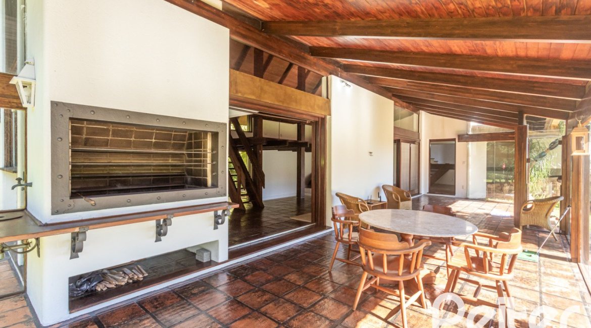 Casa em Condomínio à venda com 600m², 4 dormitórios, 4 suítes, 6 vagas, no bairro Cavalhada em PORTO ALEGRE