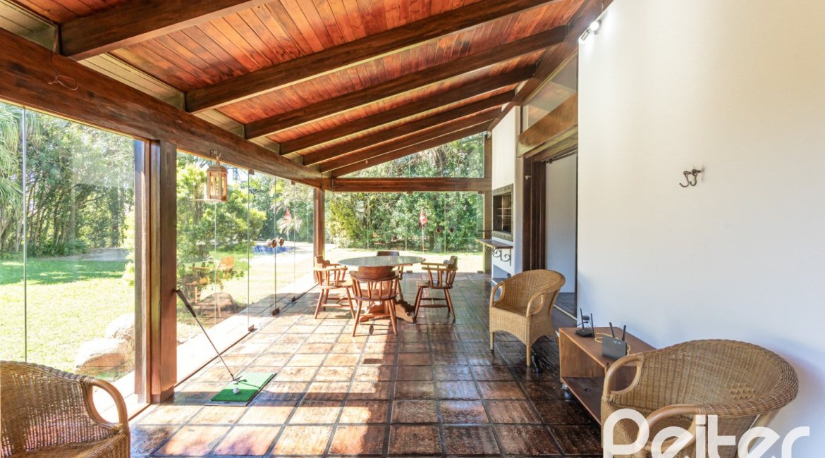 Casa em Condomínio à venda com 600m², 4 dormitórios, 4 suítes, 6 vagas, no bairro Cavalhada em PORTO ALEGRE