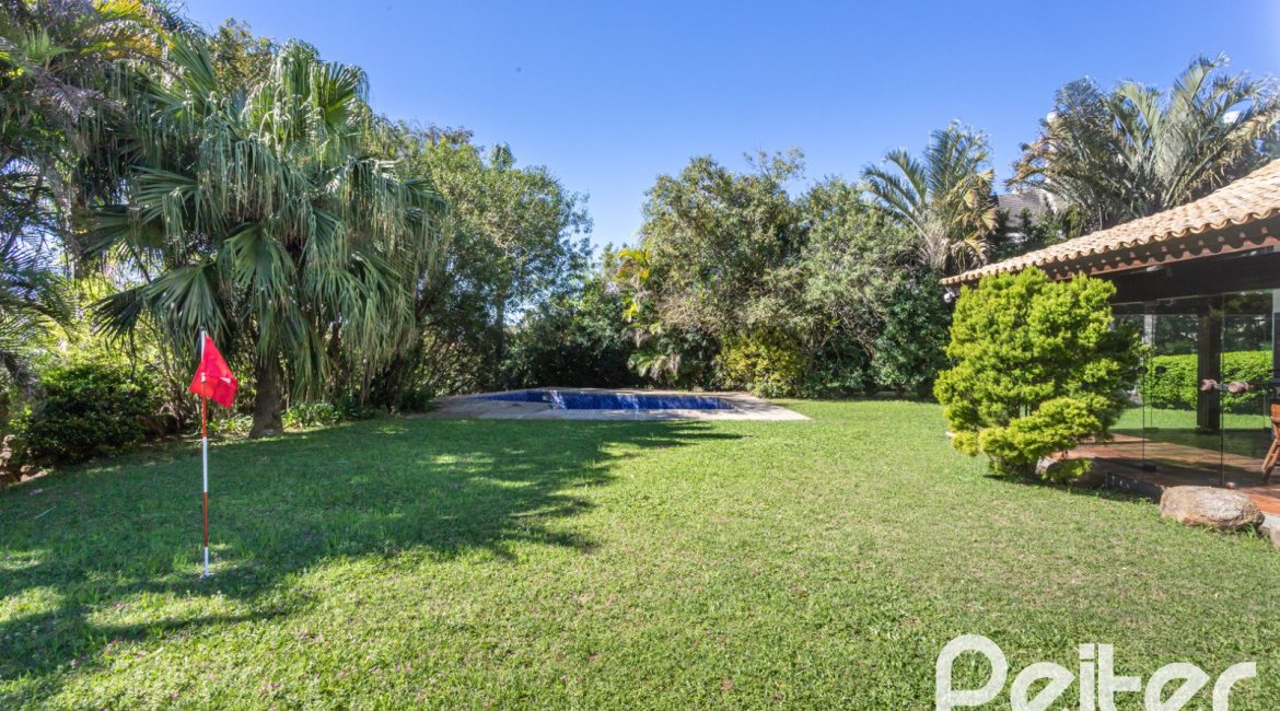 Casa em Condomínio à venda com 600m², 4 dormitórios, 4 suítes, 6 vagas, no bairro Cavalhada em PORTO ALEGRE