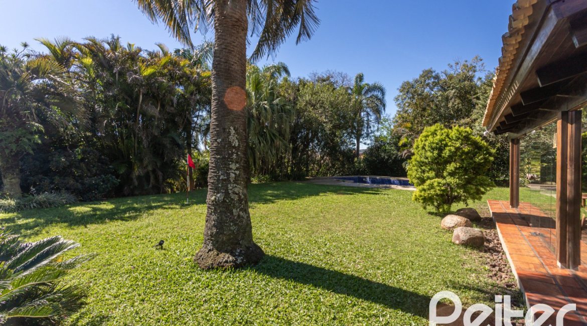 Casa em Condomínio à venda com 600m², 4 dormitórios, 4 suítes, 6 vagas, no bairro Cavalhada em PORTO ALEGRE