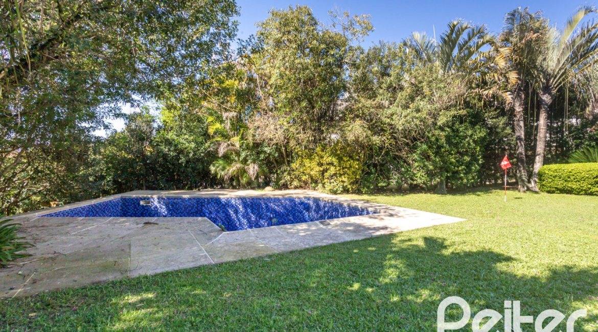 Casa em Condomínio à venda com 600m², 4 dormitórios, 4 suítes, 6 vagas, no bairro Cavalhada em PORTO ALEGRE