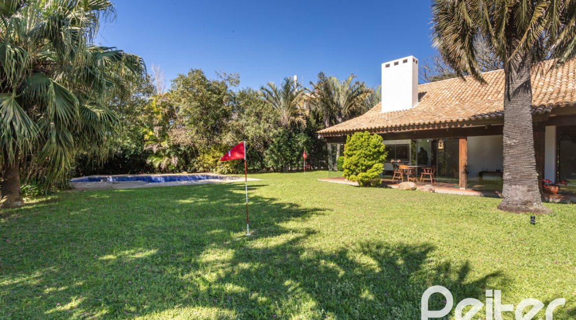 Casa em Condomínio à venda com 600m², 4 dormitórios, 4 suítes, 6 vagas, no bairro Cavalhada em PORTO ALEGRE