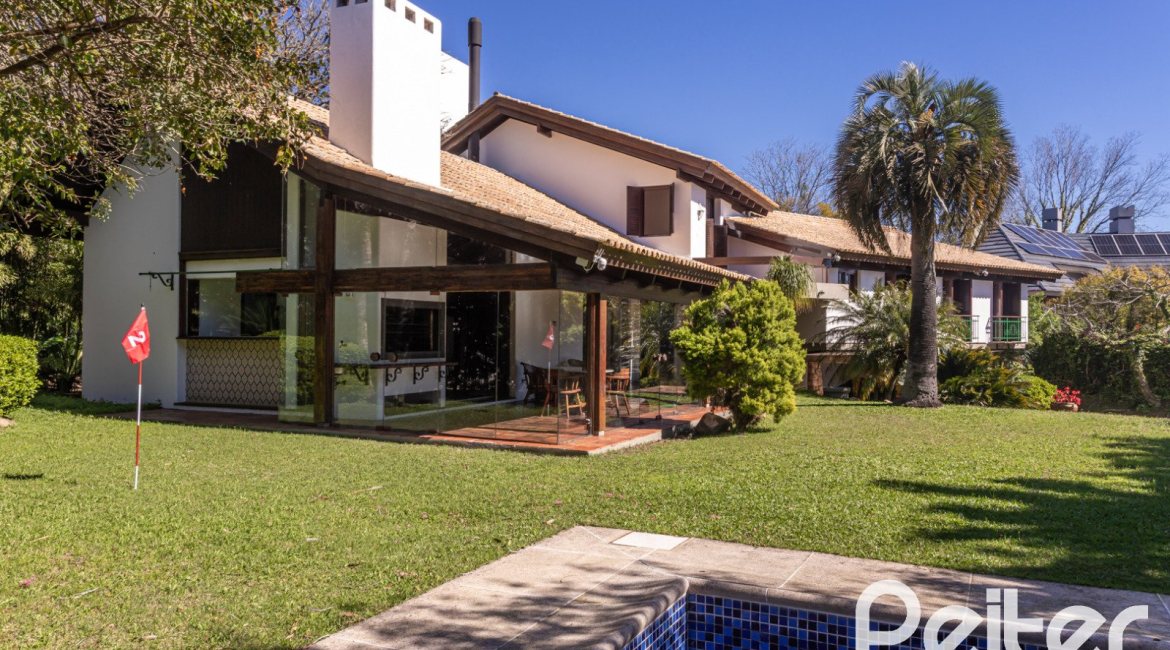 Casa em Condomínio à venda com 600m², 4 dormitórios, 4 suítes, 6 vagas, no bairro Cavalhada em PORTO ALEGRE