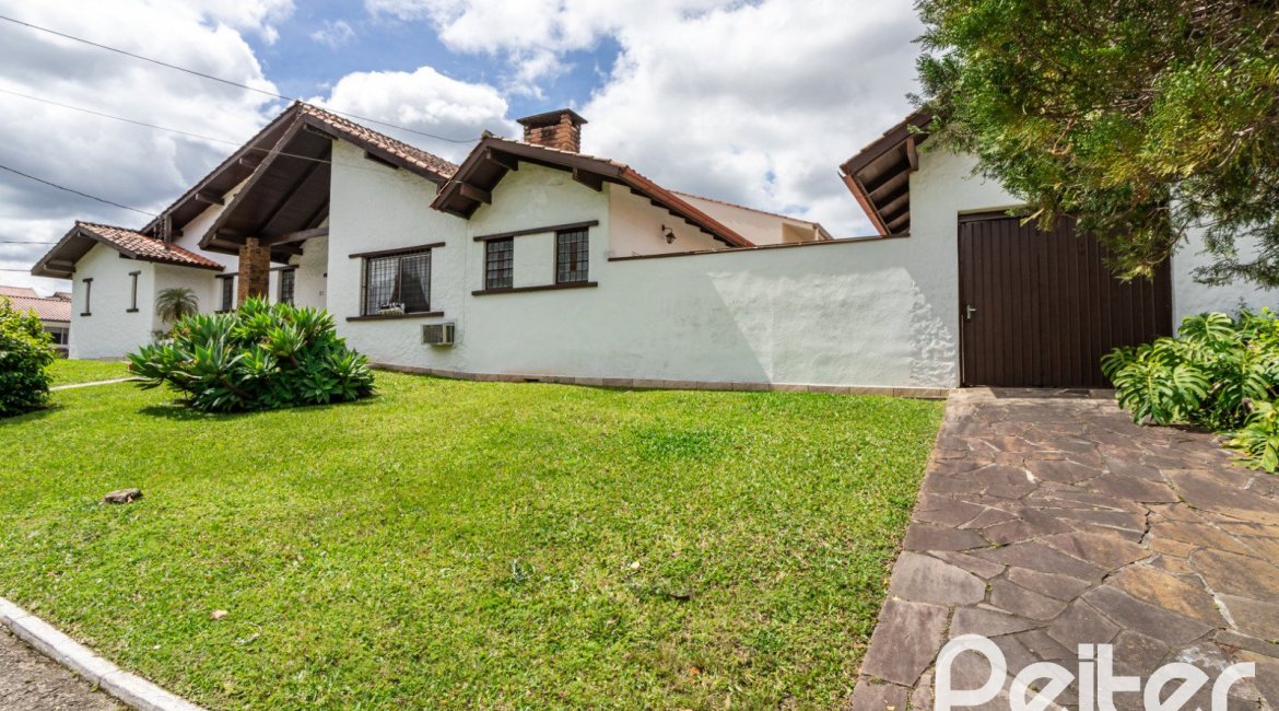 Casa em Condomínio à venda com 198m², 3 dormitórios, 1 suíte, 3 vagas, no bairro Ipanema em Porto Alegre