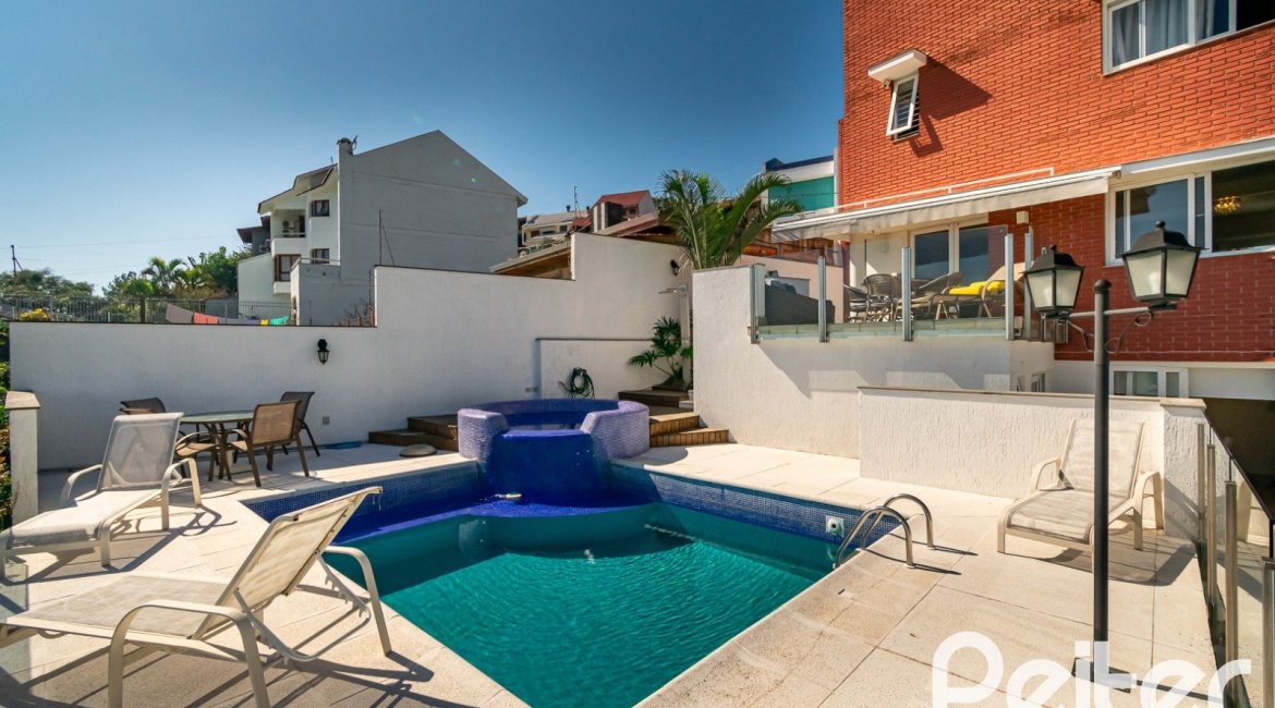 Casa em Condomínio à venda com 379m², 3 dormitórios, 1 suíte, 3 vagas, no bairro Nonoai em Porto Alegre
