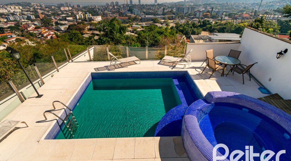 Casa em Condomínio à venda com 379m², 3 dormitórios, 1 suíte, 3 vagas, no bairro Nonoai em Porto Alegre