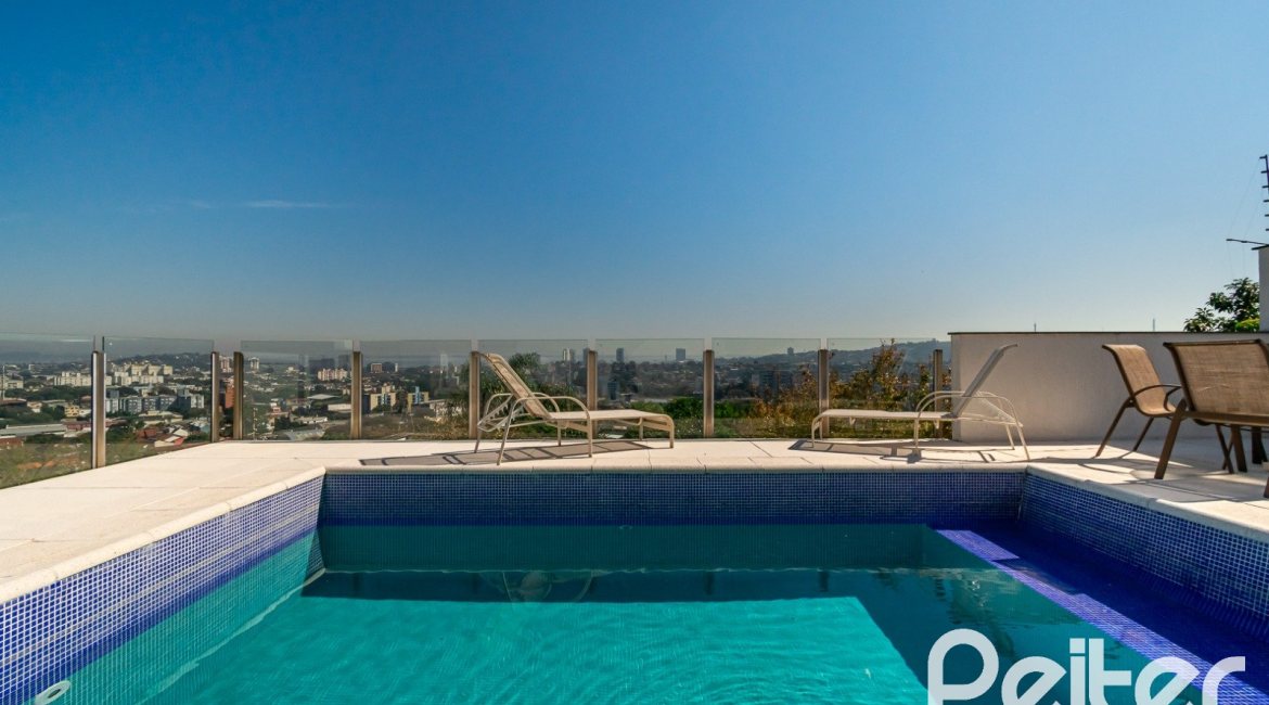 Casa em Condomínio à venda com 379m², 3 dormitórios, 1 suíte, 3 vagas, no bairro Nonoai em Porto Alegre