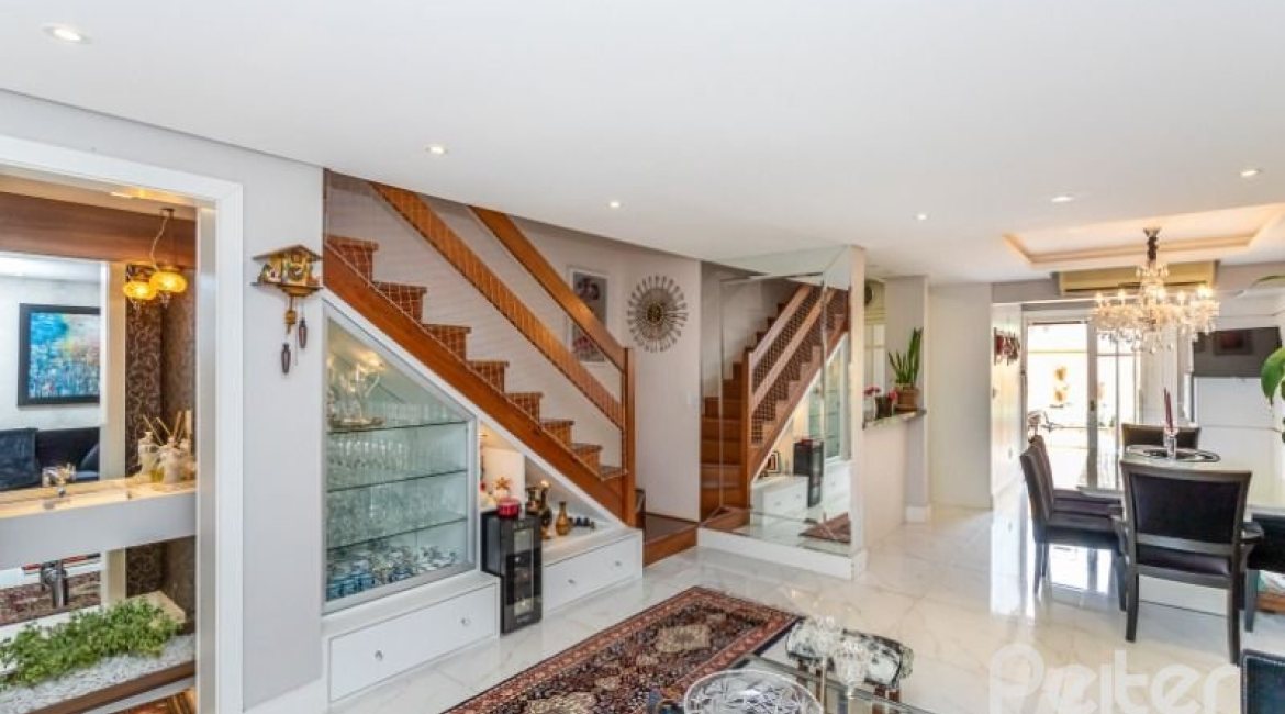 Casa em Condomínio à venda com 153m², 3 dormitórios, 1 suíte, 2 vagas, no bairro Tristeza em Porto Alegre