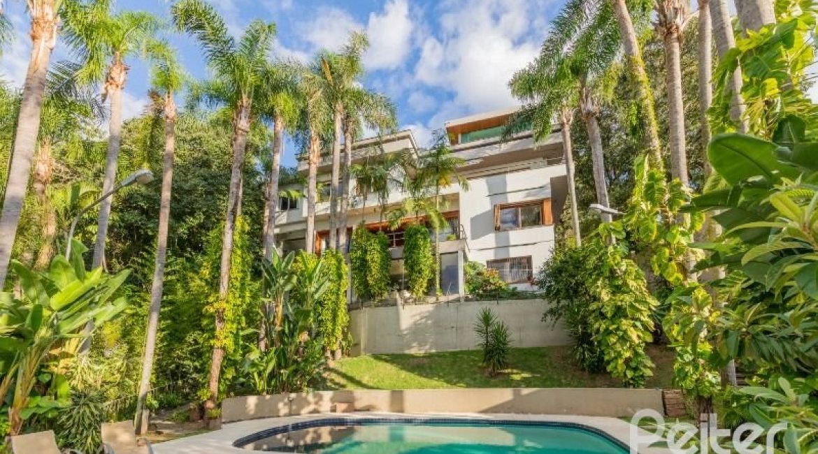 Casa à venda com 524m², 4 dormitórios, 4 suítes, 4 vagas, no bairro Vila Assunção em Porto Alegre