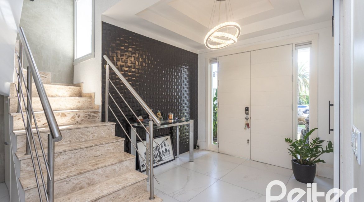 Casa em Condomínio à venda com 233m², 3 dormitórios, 3 suítes, 4 vagas, no bairro Terra Ville em PORTO ALEGRE