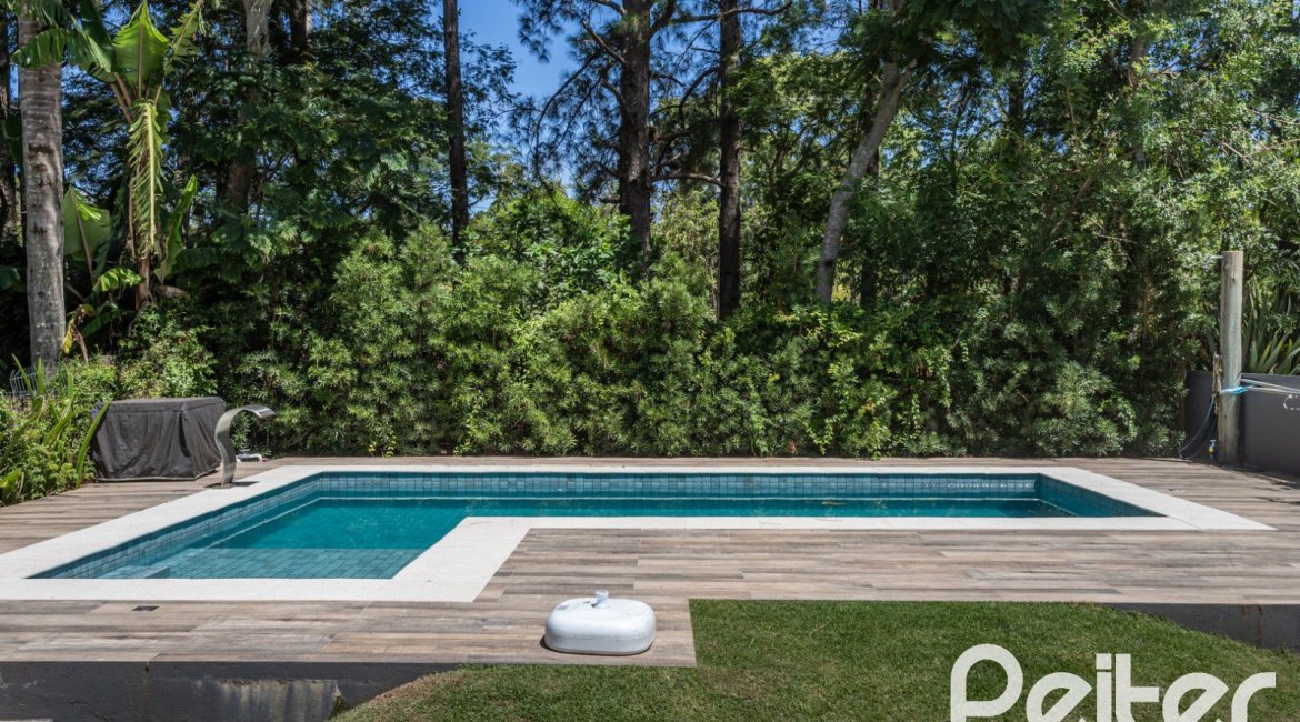 Casa em Condomínio à venda com 233m², 3 dormitórios, 3 suítes, 4 vagas, no bairro Terra Ville em PORTO ALEGRE