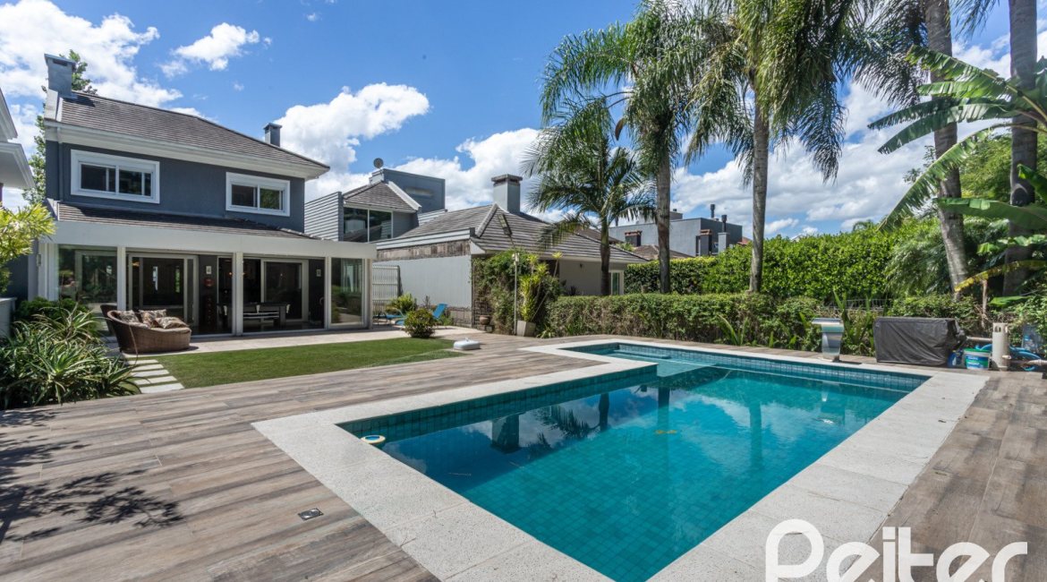 Casa em Condomínio à venda com 233m², 3 dormitórios, 3 suítes, 4 vagas, no bairro Terra Ville em PORTO ALEGRE