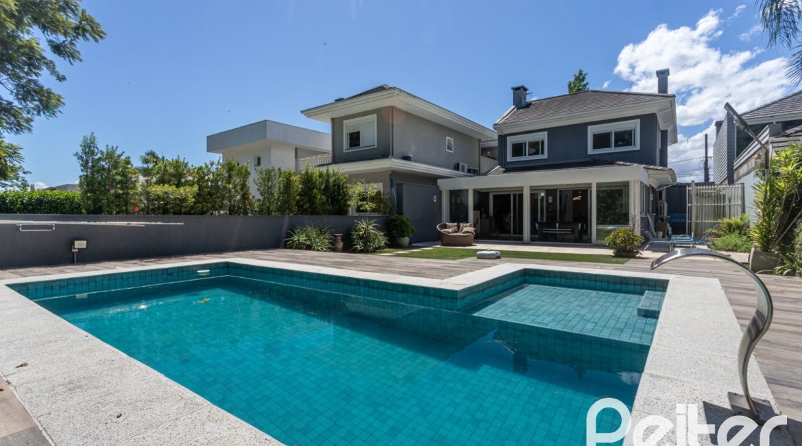 Casa em Condomínio à venda com 233m², 3 dormitórios, 3 suítes, 4 vagas, no bairro Terra Ville em PORTO ALEGRE