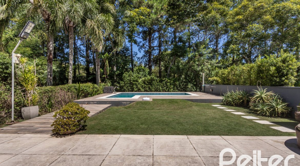 Casa em Condomínio à venda com 233m², 3 dormitórios, 3 suítes, 4 vagas, no bairro Terra Ville em PORTO ALEGRE