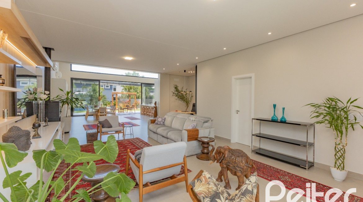 Casa em Condomínio à venda com 370m², 3 dormitórios, 3 suítes, 4 vagas, no bairro Terra Ville em PORTO ALEGRE