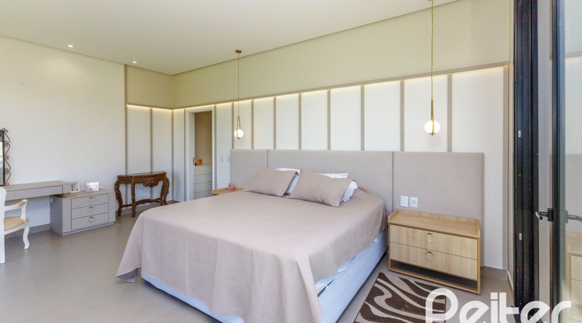 Casa em Condomínio à venda com 370m², 3 dormitórios, 3 suítes, 4 vagas, no bairro Terra Ville em PORTO ALEGRE